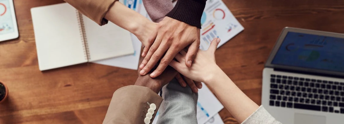 Image of people holding hands